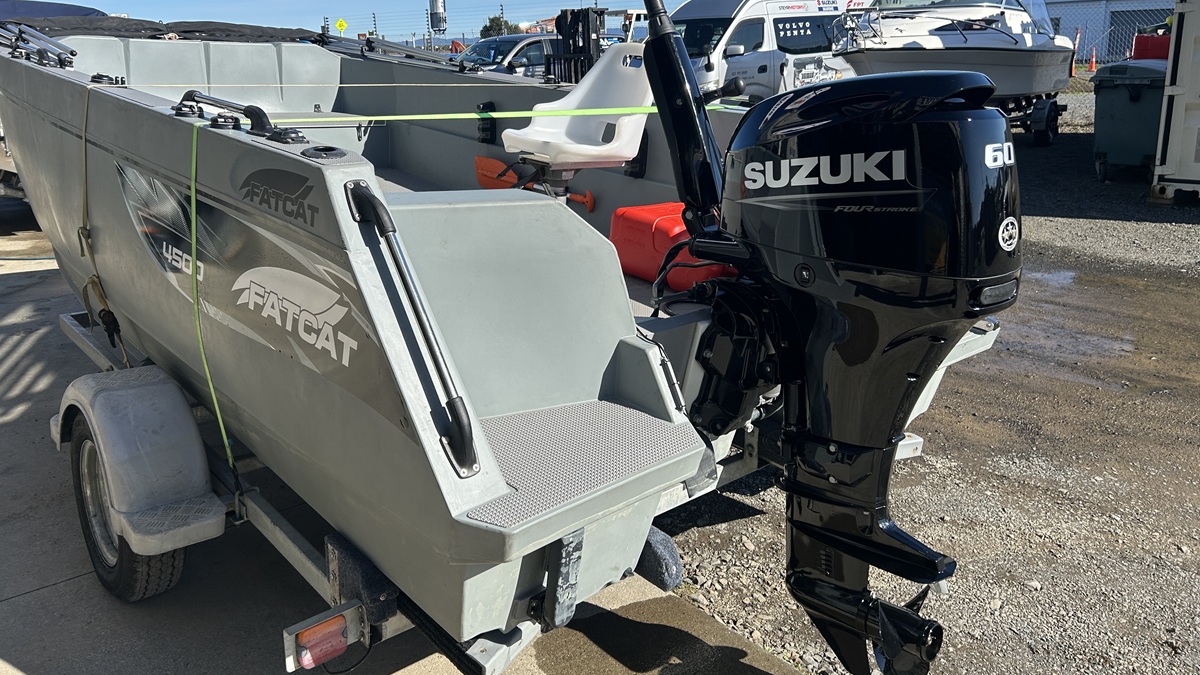 Fatcat repower with Suzuki 60hp tiller steer 4 stroke Fatcat repower with Suzuki 60hp tiller steer 4 stroke